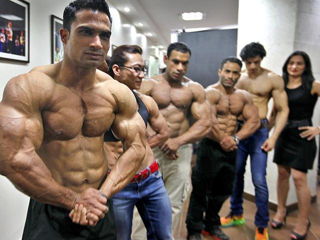 Body Builders pose during a photo call after the press conference of IBBF 6th World Body Building Championship 2014 in India, at Russian culture center in New Delhi. (Raj k Raj/ Hindustan Times)