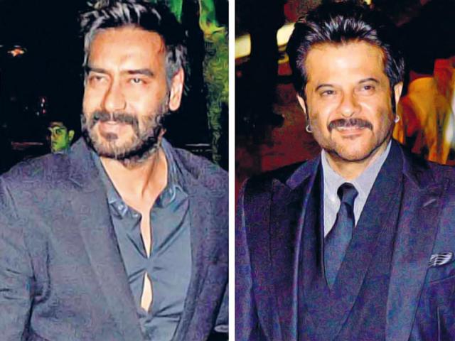 Ajay Devgn and Anil Kapoor at Arpita's reception. (Yogen Shah/HT photo)
