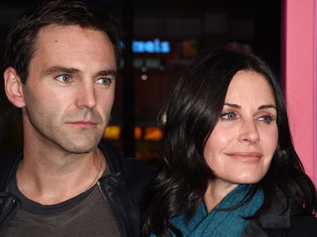 Courteney Cox and musician Johnny McDaid attend the premiere. (AFP)