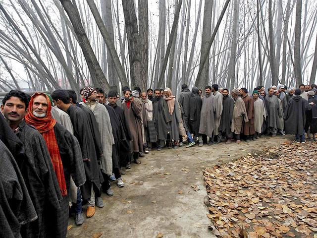 Voters-line-up-to-cast-their-votes-outside-a-polling-station-during-the-first-phase-of-the-Jammu-and-Kashmir-state-assembly-elections-at-Dangarpora-Reuters Voters-line-up-to-cast-their-votes-outside-a-polling-station-during-the-first-phase-of-the-Jammu-and-Kashmir-state-assembly-elections-at-Dangarpora-Reuters