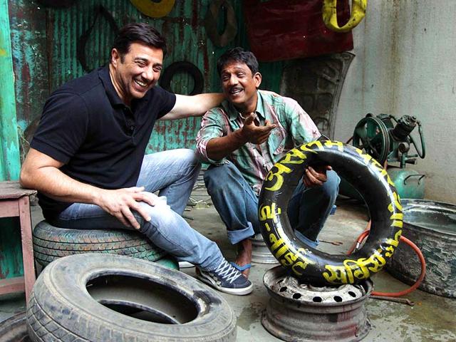 Indian Bollywood film actor, Sunny Deol, as guest, poses with Indian stage, television and film actor, Adil Hussain during the promotion of the upcoming Hindi Film Zed Plus directed by Chandraprakash Dwivedi in Mumbai. (AFP)