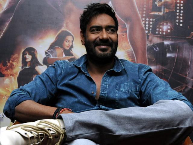 Bollywood actor Ajay Devgn talks about his upcoming film Action Jackson during his visit to Indore on Thursday. (Arun Mondhe/ HT photo)