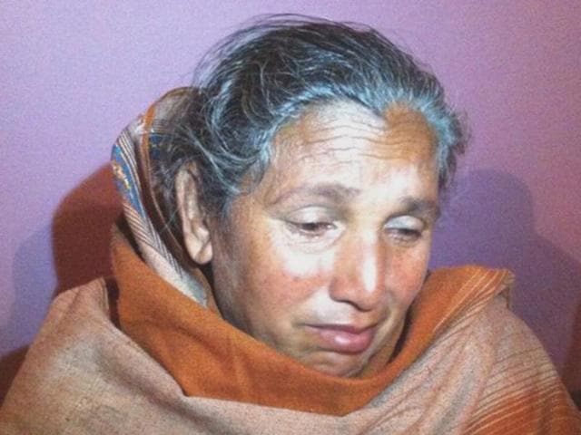 Captive-Kamaljit-s-mother-Santosh-Kumari-in-tears-after-watching-a-television-news-report-at-Chhauni-Kalan-Hoshiarpur-HT-Photo