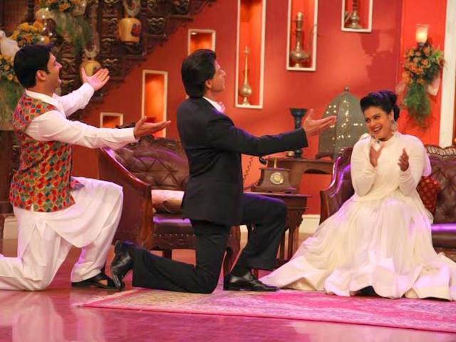 Kapil Sharma and Shah Rukh Khan try to woo Kajol on the sets of Comedy Nights with Kapil.