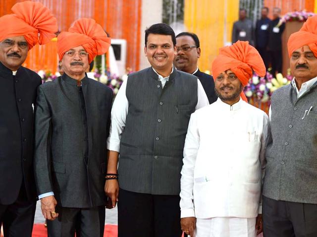Maharashtra CM Devendra Fadnavis along with Shiv Sena ministers from left Deepak Sawant, Subhash Desai, Ramdas Kadam and Diwakar Raote during their swearing-in ceremony in Mumbai. (PTI photo)