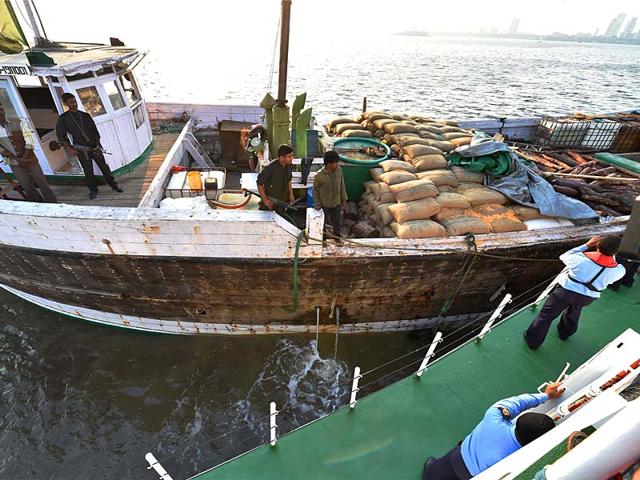 Vessel-carrying-20-tonnes-of-Red-Sanders-after-it-was-intercepted-by-officers-of-DRI-and-Coast-Guards-in-Mumbai-PTI-photo Vessel-carrying-20-tonnes-of-Red-Sanders-after-it-was-intercepted-by-officers-of-DRI-and-Coast-Guards-in-Mumbai-PTI-photo