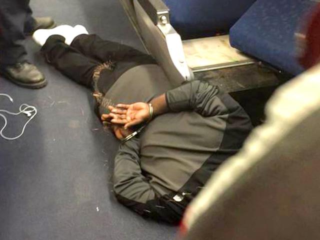 A-man-is-seen-in-custody-aboard-an-Amtrak-train-following-a-stabbing-incident-in-Niles-Michigan-Reuters-Photo