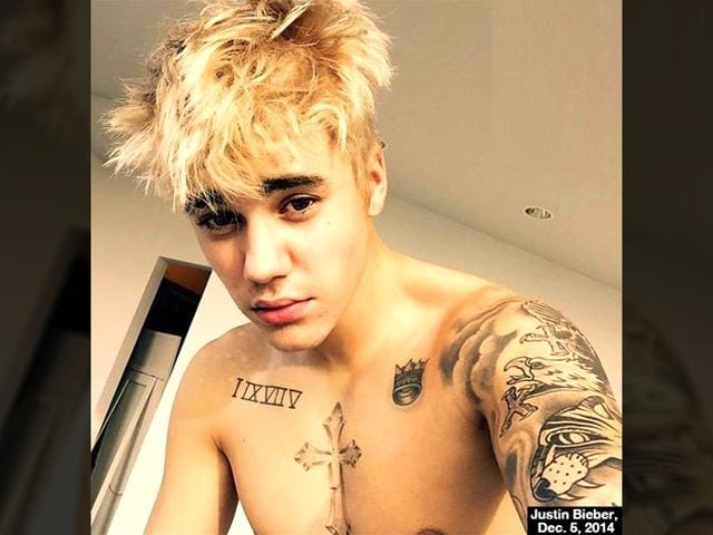 See pic: Justin Bieber shows off new blonde hair in shirtless selfie -  Hindustan Times
