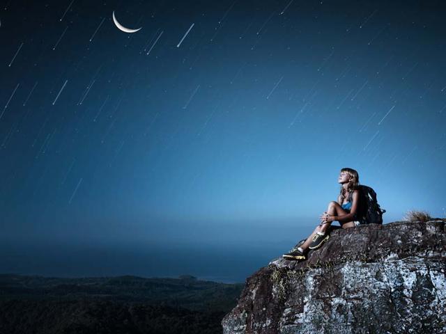 Woman-looking-at-stars-Shutterstock-image