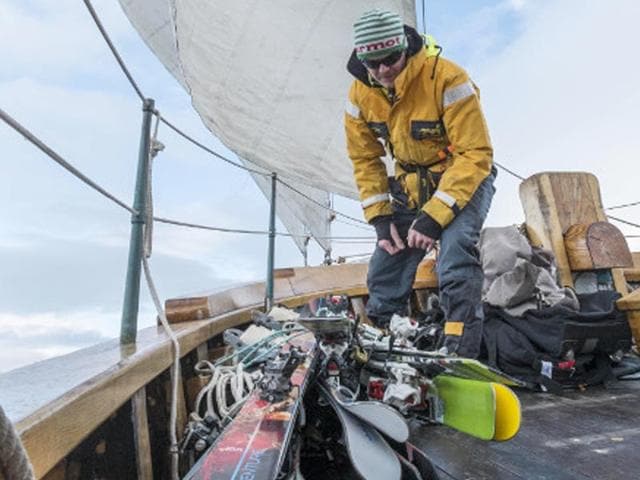 Skiers prepare their gear on the Viking Heliskiing Iceland schooner.