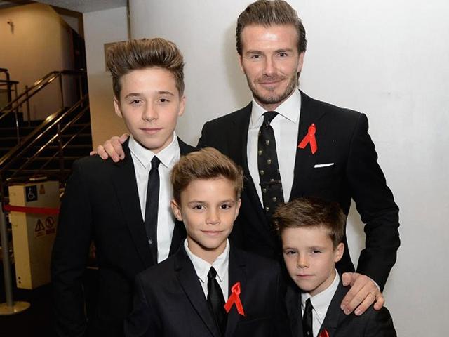 Former-footballer-David-Beckham-seen-here-with-sons-Brooklyn-Romeo-and-Cruz-He-also-has-a-daughter-Harpar-with-wife-Victoria-AFP