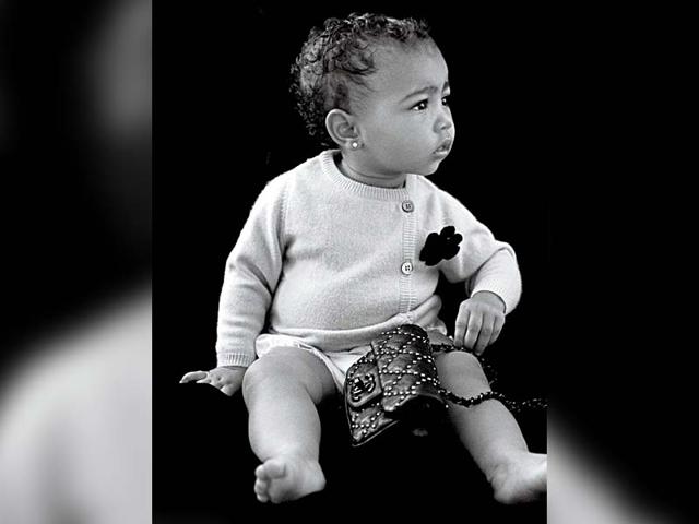 North West made her modelling debut in CR Fashion Book. She was styled in Channel; here she is wearing a knitted Channel jumper and purse. The black and white picture made her outfit look even more classic, don't you think? The fact that creative director Karl Lagerfeld said, "It is never too early to care about fashion," seems to be the inspiration behind North's looks. You like? North West made her modelling debut in CR Fashion Book. She was styled in Channel; here she is wearing a knitted Channel jumper and purse. The black and white picture made her outfit look even more classic, don't you think? The fact that creative director Karl Lagerfeld said, "It is never too early to care about fashion," seems to be the inspiration behind North's looks. You like?