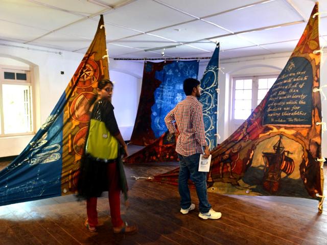 Lavanya Mani’s Travellers Tales-Blueprint at Aspinwall House is a painting using natural dye on fabric and evokes the sails of a ship. The imagery uses the Kalamkari technique.