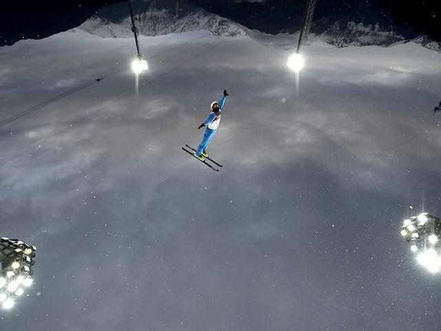 Belarus' Anton Kushnir competes during the men's freestyle skiing aerials qualification round at the 2014 Sochi Winter Olympic Games in Rosa Khutor. (Reuters Photo)