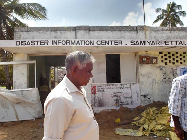 A-resident-walks-past-a-neglected-Disaster-Information-Center-in-Samiyarpettai-along-the-Tamil-Nadu-coast-HT-Photo-Gurinder-Osan A-resident-walks-past-a-neglected-Disaster-Information-Center-in-Samiyarpettai-along-the-Tamil-Nadu-coast-HT-Photo-Gurinder-Osan