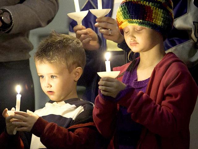 Christmas cheer: Children participating in the Candlelight Communion Service at the Fountain Avenue United Methodist Church in Paducah, Ky., in the US on Christmas Eve night.