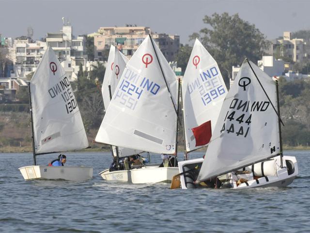 Sailors compete in the National Inland Optimist Sailing Championship 2014, in Bhopal on Saturday. The event will be held till December 30. (Mujeeb Faruqui/HT photo)