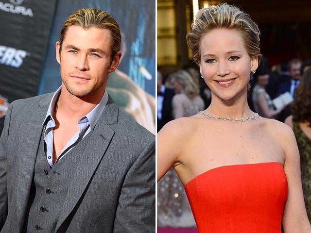 1. Chris Hemsworth and Jennifer LawrenceCould he be the new Brad Pitt? At any rate, the Australian actor's turquoise blue eyes and perfectly sculpted abs have plenty of women swooning. Too bad he's taken. Chris has been married to the actor Elsa Pataky since 2010. In first place in FHM's ranking of the sexiest women of 2014, Lawrecne was clearly in the limelight this year. Here, at the 86th Academy Awards ceremony, she confidently shows off her figure in a stunning red Dior dress. 1. Chris Hemsworth and Jennifer LawrenceCould he be the new Brad Pitt? At any rate, the Australian actor's turquoise blue eyes and perfectly sculpted abs have plenty of women swooning. Too bad he's taken. Chris has been married to the actor Elsa Pataky since 2010. In first place in FHM's ranking of the sexiest women of 2014, Lawrecne was clearly in the limelight this year. Here, at the 86th Academy Awards ceremony, she confidently shows off her figure in a stunning red Dior dress.
