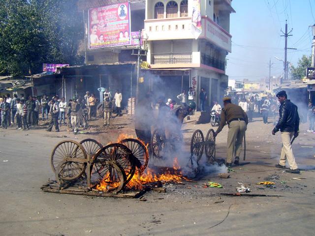 Handcarts set on fire in Gairatganj town of Raisen district after communal violence on Monday. (HT photo)