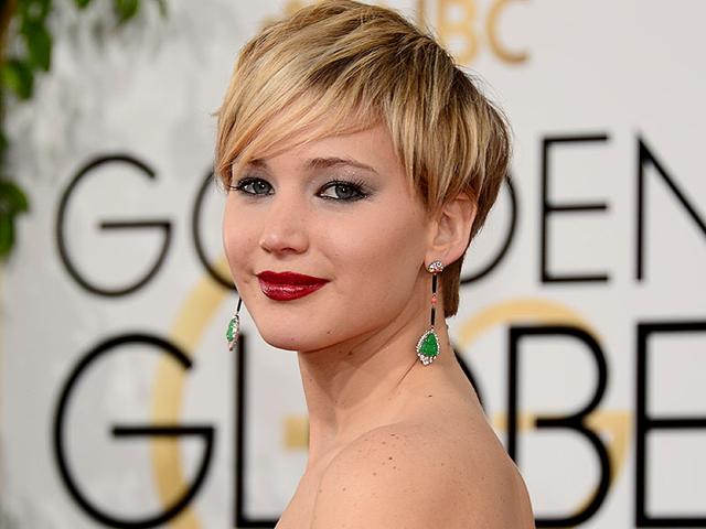 2014 was a great year for make-up enthusiasts, as celebrities were particularly creative in their efforts to turn heads while keeping things 'natural'. With 2015 here, we take a look back at some of the most beautiful make-up art seen on the red carpet this year. (All Photos: AFP) | Jennifer Lawrence: The actress and Dior spokesmodel pulled out all the stops for the Golden Globes ceremony in Beverly Hills. Scarlet lips and dark eyes: the epitome of glamor. 
