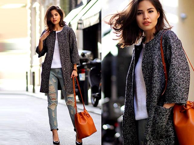 Cosy coats in neutrals like cream, grey and camel are the covetable pieces this January, with tweedy, fuzzy, soft and nubby styles being mixed with lots of ripped denim and chunky knits. Get inspired by these looks. (AFP)