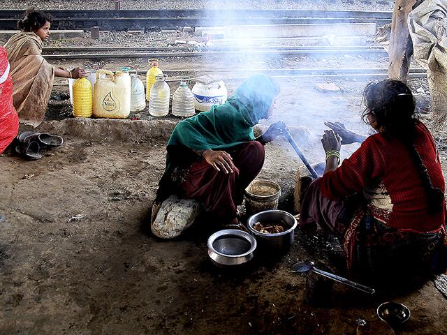 Forty-year-old Guddi lives with her husband and three daughters in Delhi. Her husband works as a daily-wage labourer. Migrated from Kanpur to Delhi five years ago, the family still struggles to find a decent shelter in the city. (Subrata Biswas/HT Photo)