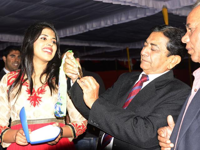 MP's Varsha Varman celebrates her success during her visit to Bhopal on Monday. She had won a bronze medal at Incheon Asian Games in September. (Mujeeb Faruqui/HT photo)