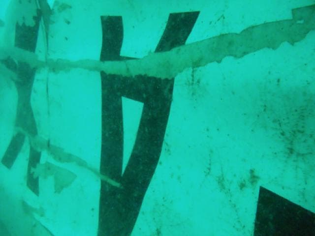 In-this-underwater-photo-released-by-Indonesia-s-National-Search-And-Rescue-Agency-BASARNAS-the-part-of-the-wreckage-that-BASARNAS-identified-as-of-the-ill-fated-AirAsia-Flight-8501-is-seen-in-the-waters-of-the-Java-Sea-Indonesia-AP-Photo In-this-underwater-photo-released-by-Indonesia-s-National-Search-And-Rescue-Agency-BASARNAS-the-part-of-the-wreckage-that-BASARNAS-identified-as-of-the-ill-fated-AirAsia-Flight-8501-is-seen-in-the-waters-of-the-Java-Sea-Indonesia-AP-Photo