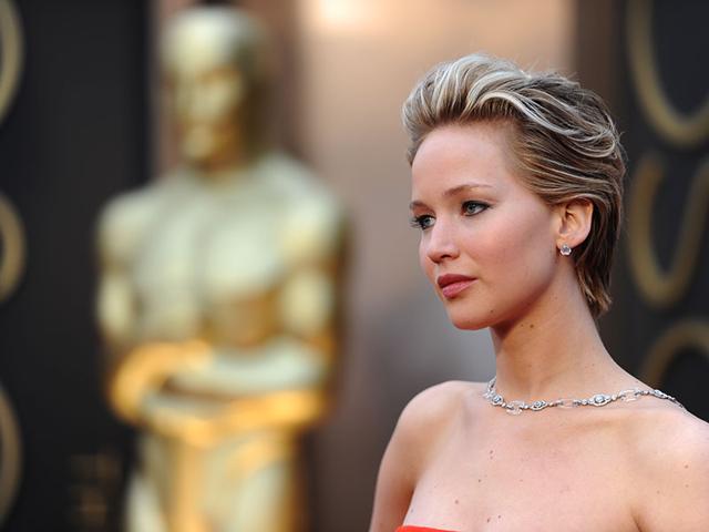 Jennifer Lawrence: Formerly seen with long dark hair, for the most part, the actress transformed her look in 2014 with a short cut and rock 'n' roll blonde highlights. Here, she poses on the red carpet at the 86th Oscars ceremony in Hollywood. Jennifer Lawrence: Formerly seen with long dark hair, for the most part, the actress transformed her look in 2014 with a short cut and rock 'n' roll blonde highlights. Here, she poses on the red carpet at the 86th Oscars ceremony in Hollywood.