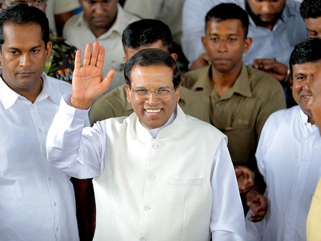 Sri-Lanka-s-newly-elected-president-Maithripala-Sirisena-leaves-the-opposition-leader-s-office-after-meeting-with-political-leaders-who-supported-him-in-the-capital-Colombo-AFP-Photo Sri-Lanka-s-newly-elected-president-Maithripala-Sirisena-leaves-the-opposition-leader-s-office-after-meeting-with-political-leaders-who-supported-him-in-the-capital-Colombo-AFP-Photo