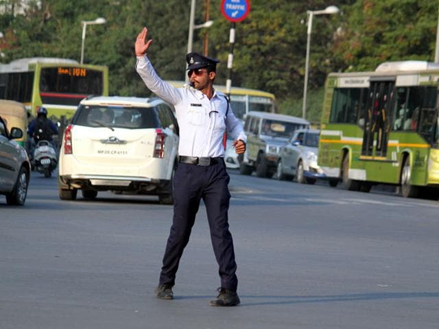 Sumant-Singh-Kachhawa-controls-traffic-at-White-Church-Road-junction-in-Indore-on-Thursday-Shankar-Mourya-HT-photo