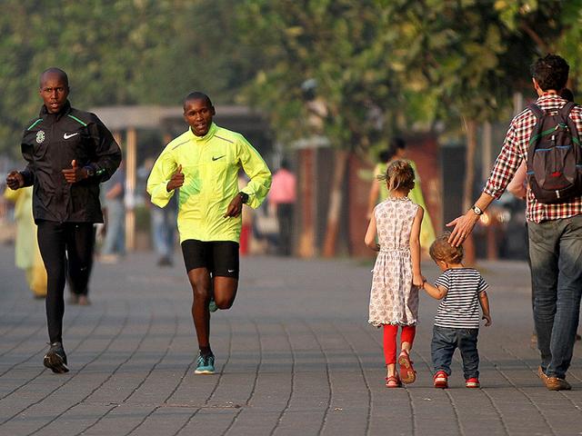 International athletes practise ahead of the Mumbai Marathon on Marine Drive in Mumbai. (Arijit Sen/HT photo)