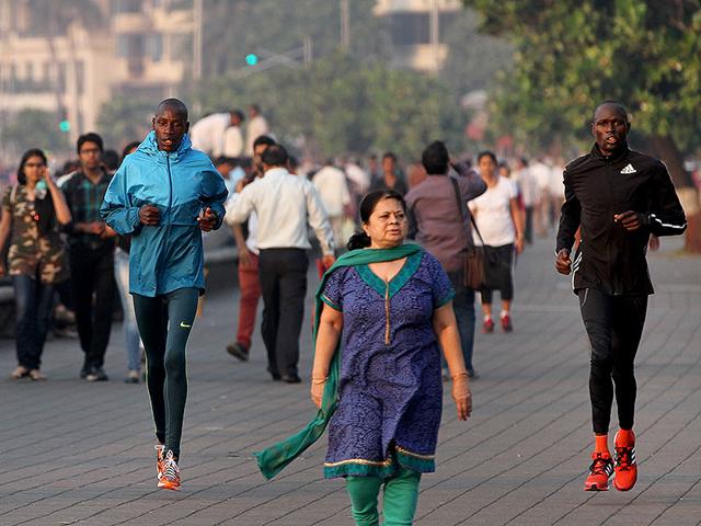 International athletes practise ahead of the Mumbai Marathon on Marine Drive in Mumbai. (Arijit Sen/HT photo)