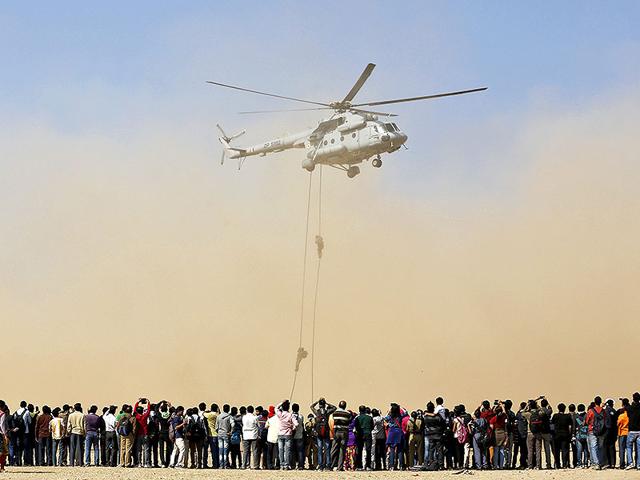 Indian Air Force (IAF) soldiers perform during an awareness drive in Ahmedabad. (Reuters)