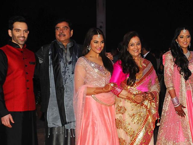 The family that poses together... Shatrughan Sinha with his wife Poonam, pose with children Luv, Sonakshi and daughter-in-law Taruna. (AFP)