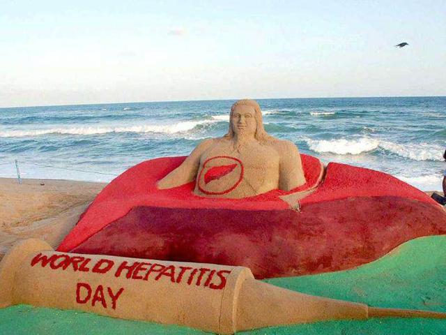 Sand-artist-Sudarsan-Pattnaik-creates-a-sand-sculpture-on-World-Hepatitis-day-at-Puri-beach-HT-Photo