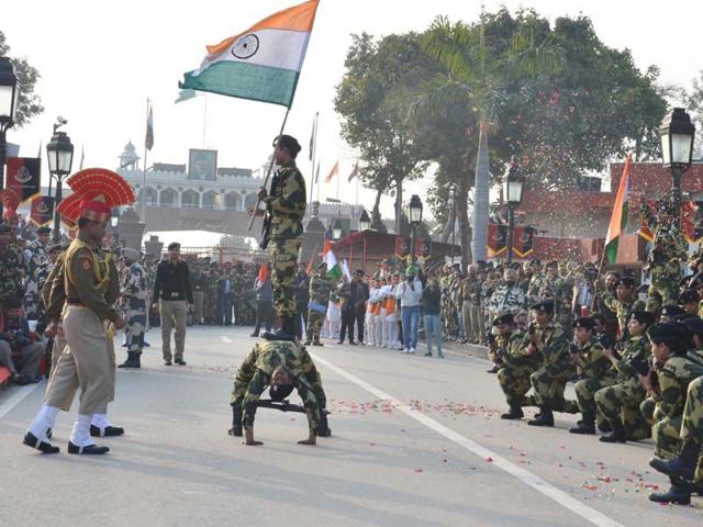 BSF jawans during 66th republic day celebration at Attari-Wagah joint check post in Amritsar on Sunday. Sameer Sehgal/HT