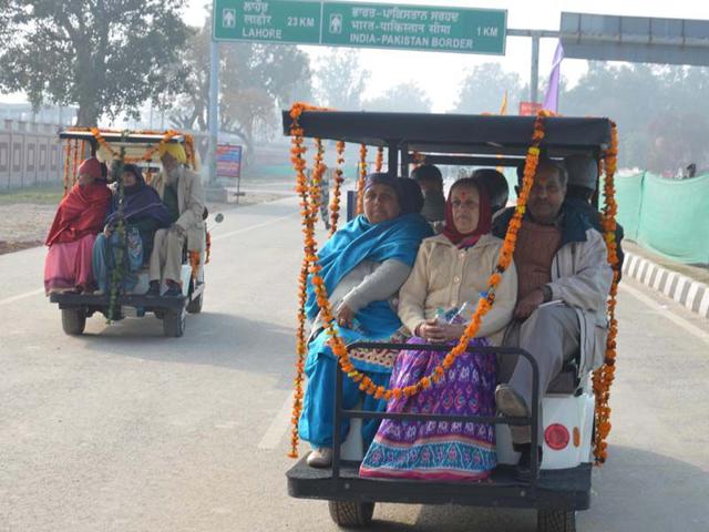 Tourists coming to the Retreat ceremony at the Attari-Wagah joint check post in Amritsar on Sunday. Sameer Sehgal/HT