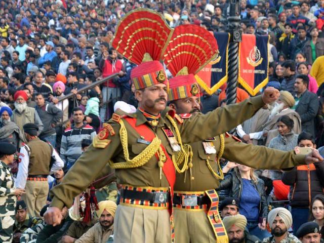 BSF jawans during the retreat ceremony at Attari-Wagah joint check post in Amritsar on Sunday. Sameer Sehgal/HT