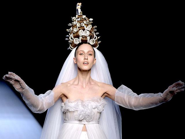 Jean Paul Gaultier: The highly anticipated Spring-Summer 2015 haute couture collection from Jean Paul Gaultier debuted at the couturier's own space on the Rue Saint-Martin in Paris. Eccentric wedding gowns, natural inspirations, and an urban chic setting: the couturier ensured all the elements were in place for a great show.