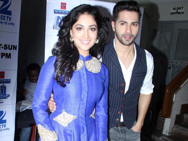 Actors Varun Dhawan and Yami Gautam promote their film Badlapur on the sets of Zee TV reality show Sa Re Ga Ma Pa Li'l Champs. (IANS)