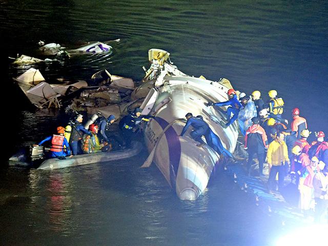 At least 26 passengers of the 58 people aboard were killed in the crash. (AFP Photo)