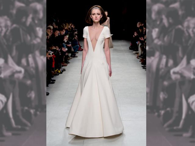 Sporty turned-up sleeves and a plunging neckline offer a fresh look for Hollywood's leading ladies at Julien Fournié