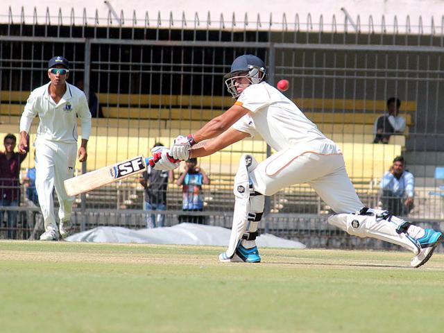 Mohnish Mishra of Madhya Pradesh in action against Bengal on the second day of Ranji match in Indore on Saturday. (Shankar Mourya/HT photo)