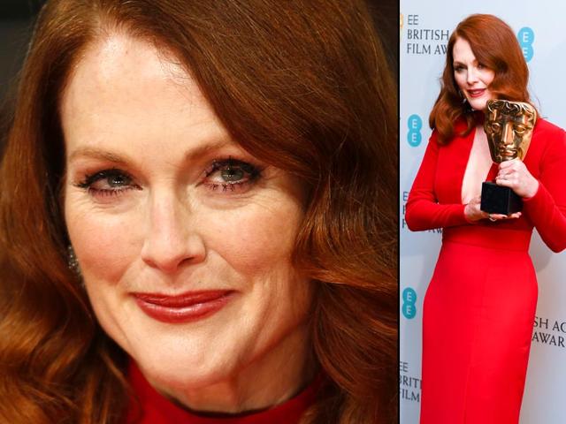 Still Alice actor Julianne Moore looks sexy in a red Tom Ford dress at BAFTA Awards. (AFP)