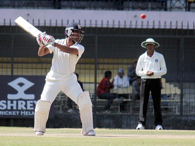 Wridhiman Saha of Bengal in action against MP on the fourth and last day of Ranji trophy match in Indore on Monday. (Shankar Mourya/HT photo)
