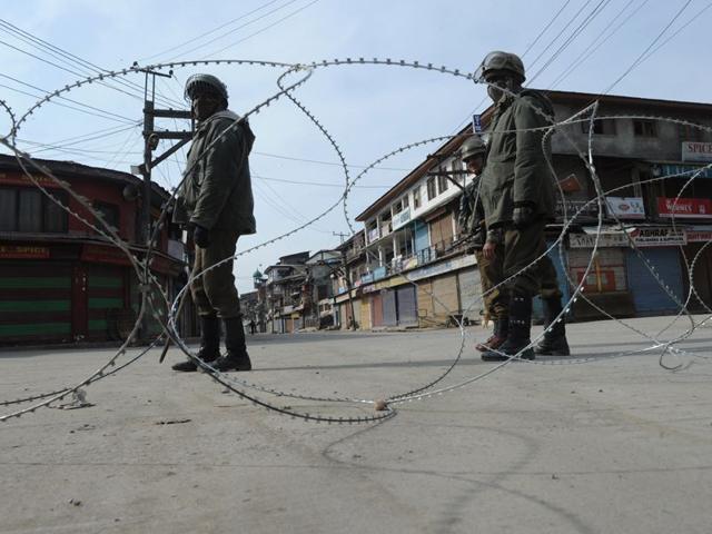 Shops and business establishments remained closed and people stayed indoors in Srinagar on Wednesday over a demand for the remains of Mohammad Maqbool Bhat.AFP/Photo
