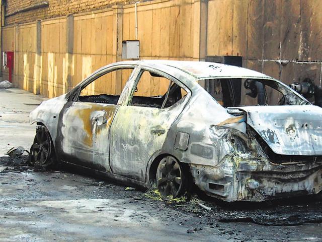 Over-a-dozen-garment-manufacturing-units-were-vandalized-and-over-100-cars-were-damaged-by-400-factory-workers-in-Udyog-Vihar-Phase-2-Gurgaon-Manoj-Kumar-HT-Photo Over-a-dozen-garment-manufacturing-units-were-vandalized-and-over-100-cars-were-damaged-by-400-factory-workers-in-Udyog-Vihar-Phase-2-Gurgaon-Manoj-Kumar-HT-Photo