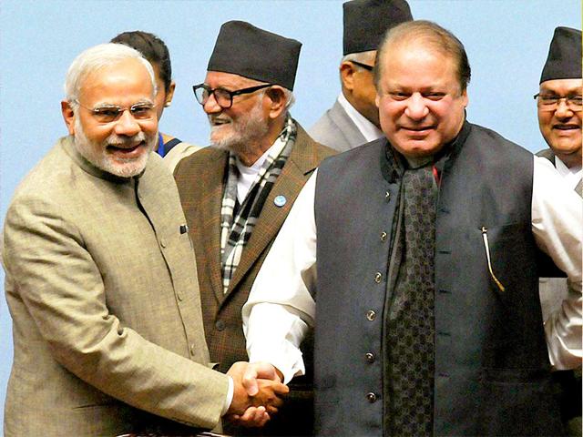 Prime-Minister-Narendra-Modi-shakes-hands-with-his-Pakistani-counterpart-Nawaz-Sharif-at-the-18th-SAARC-Summit-in-Kathmandu-Nepal-PTI-photo Prime-Minister-Narendra-Modi-shakes-hands-with-his-Pakistani-counterpart-Nawaz-Sharif-at-the-18th-SAARC-Summit-in-Kathmandu-Nepal-PTI-photo