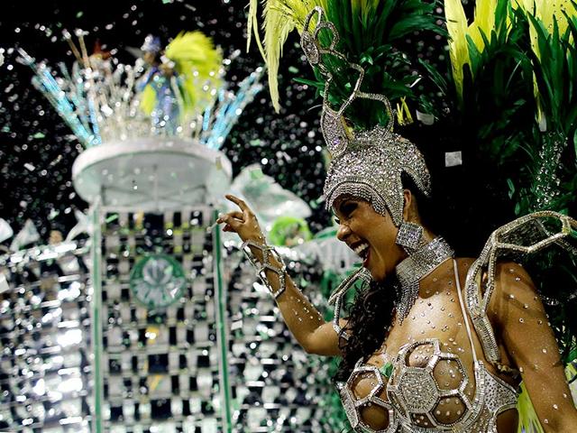 A reveller from the Mancha Verde Samba School takes part in a carnival at Anhembi Sambadrome in Sao Paulo on Valentine's Day. (Reuters)